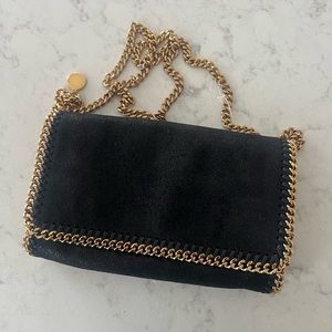 BNWT Stella MC Cartney Falabella small shoulder bag clutch. Black/Gold